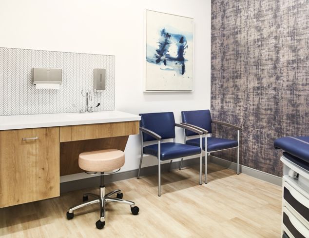 Exam room in a hospital with Textured Woodgrains LVT tiles