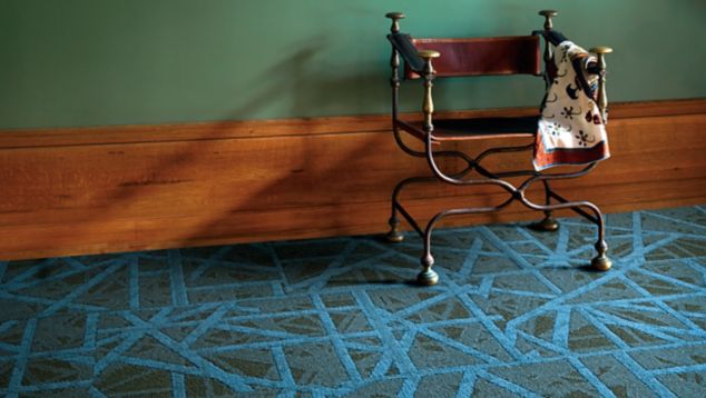 Interface PM59 plank carpet tile in small area with antique chair and green wall