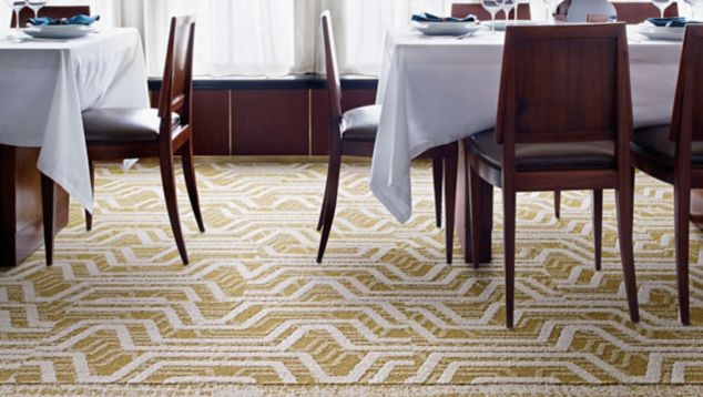 Interface PM01 and PM19 plank carpet tile in upscale dining area