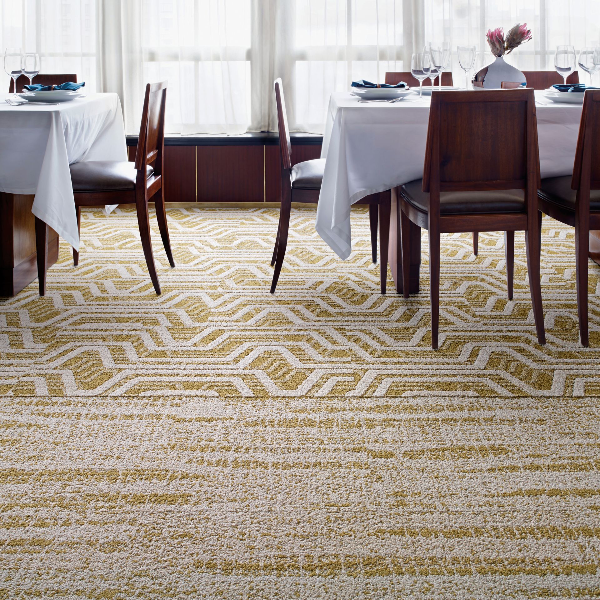 Interface PM01 and PM19 plank carpet tile in upscale dining area