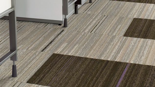 Interface Reincarnation carpet tile in office walkway