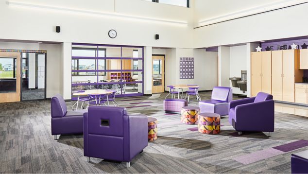 Interface Driftwood and On Line plank carpet tile in seating area of K-12 facility