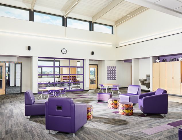 Interface Driftwood and On Line plank carpet tile in seating area of K-12 facility