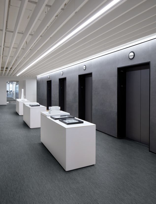 Interface Brushed Lines LVT in elevator lobby area