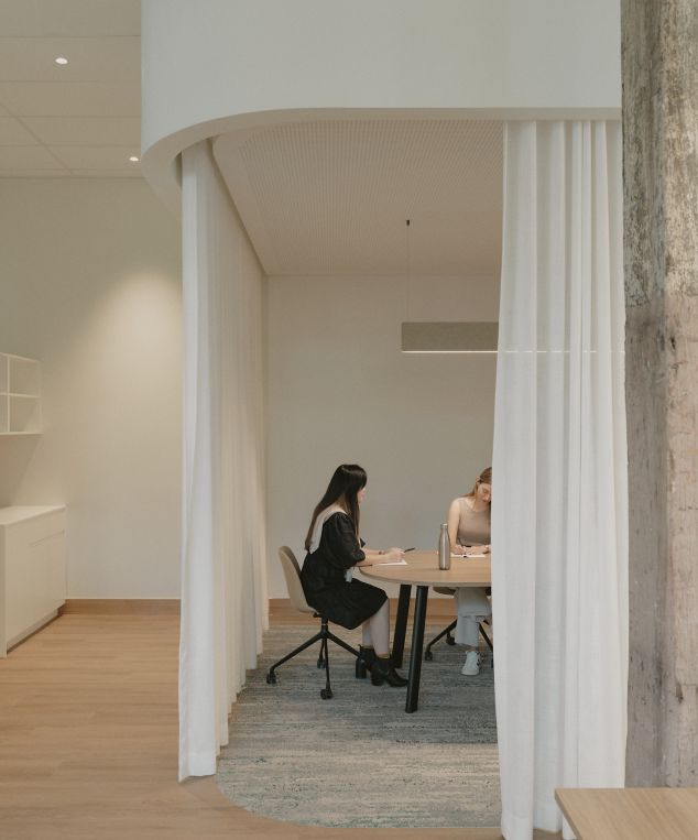Interface Textured Woodgrains LVT with Shallows plank carpet tile in workplace corridor and collaborative space