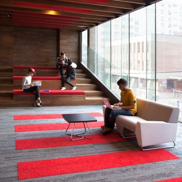 Interface HN810 and HN830 plank carpet tile in higher education housing public area