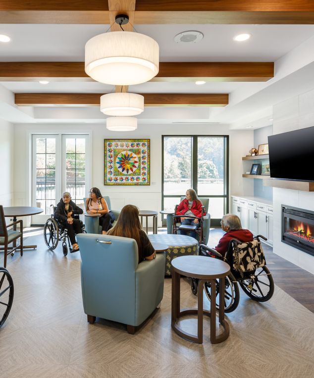 Interface Textured Woodgrains plank LVT with Ridge LVT in senior living lounge