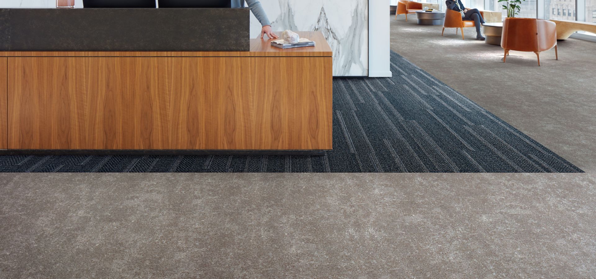 Interface Simple Sash plank carpet tile and Walk of Life LVT in a corporate lobby area with front desk 