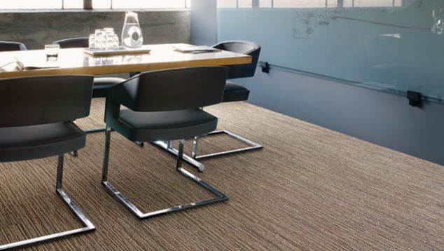 Interface Winter Sun plank carpet tile in meeting room with table and chairs