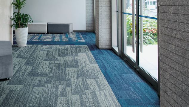 Interface AE311, AE315 and AE317 plank carpet tile in multifamily corridor