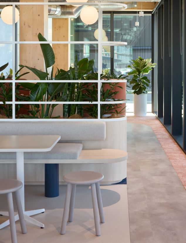 Interface Level Set Textured Stones LVT with Escarpment carpet tile in workplace breakroom