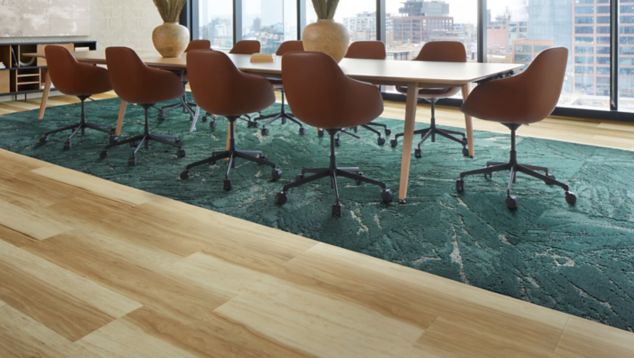 Interface Great Heights LVT and FLOR Zera in Pine shown in a conference room