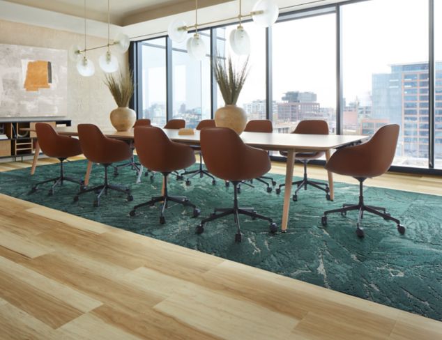 Interface Great Heights LVT and FLOR Zera in Pine shown in a conference room