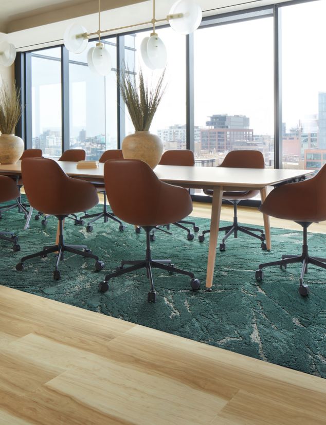 Interface Great Heights LVT and FLOR Zera in Pine shown in a conference room