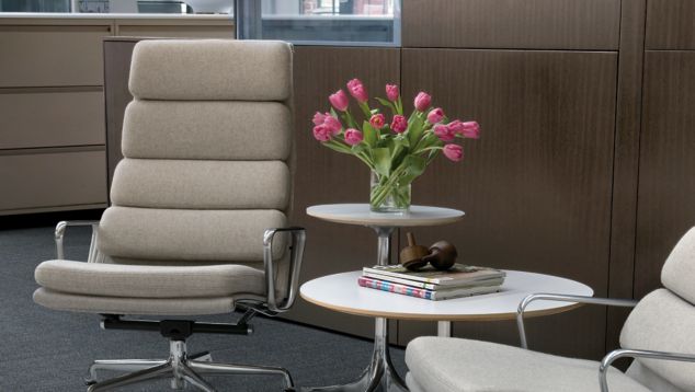 Interface Brescia carpet tile in office seating area with white chairs and pink tulips
