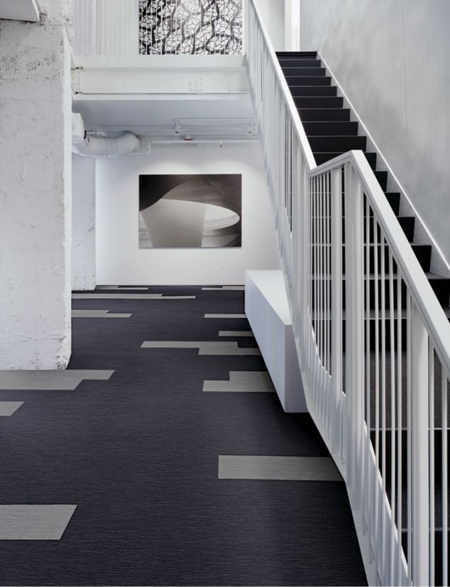 Interface Brushed Lines LVT in building with stairwell
