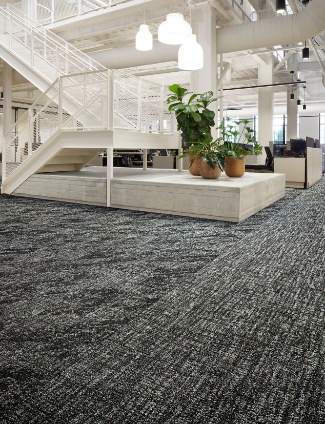 Interface C551 and C552 plank carpet tile in open area with stairs and workspaces