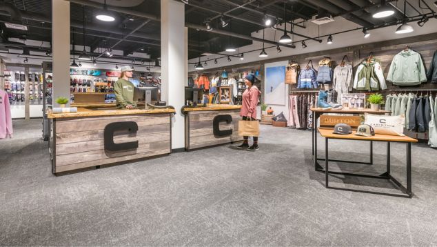 Interface Ice Breaker carpet tile in clothing shop with snowboarding and ski equipment