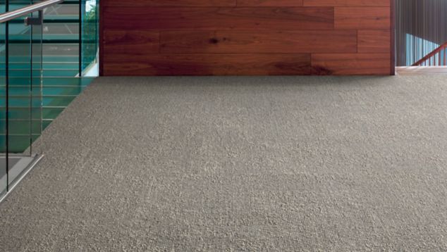 Interface Cloud Cover carpet tile in reception area with wood desk