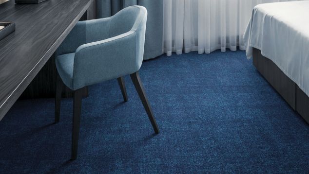 Interface Cloud Cover carpet tile in hotel guest room with chair and desk