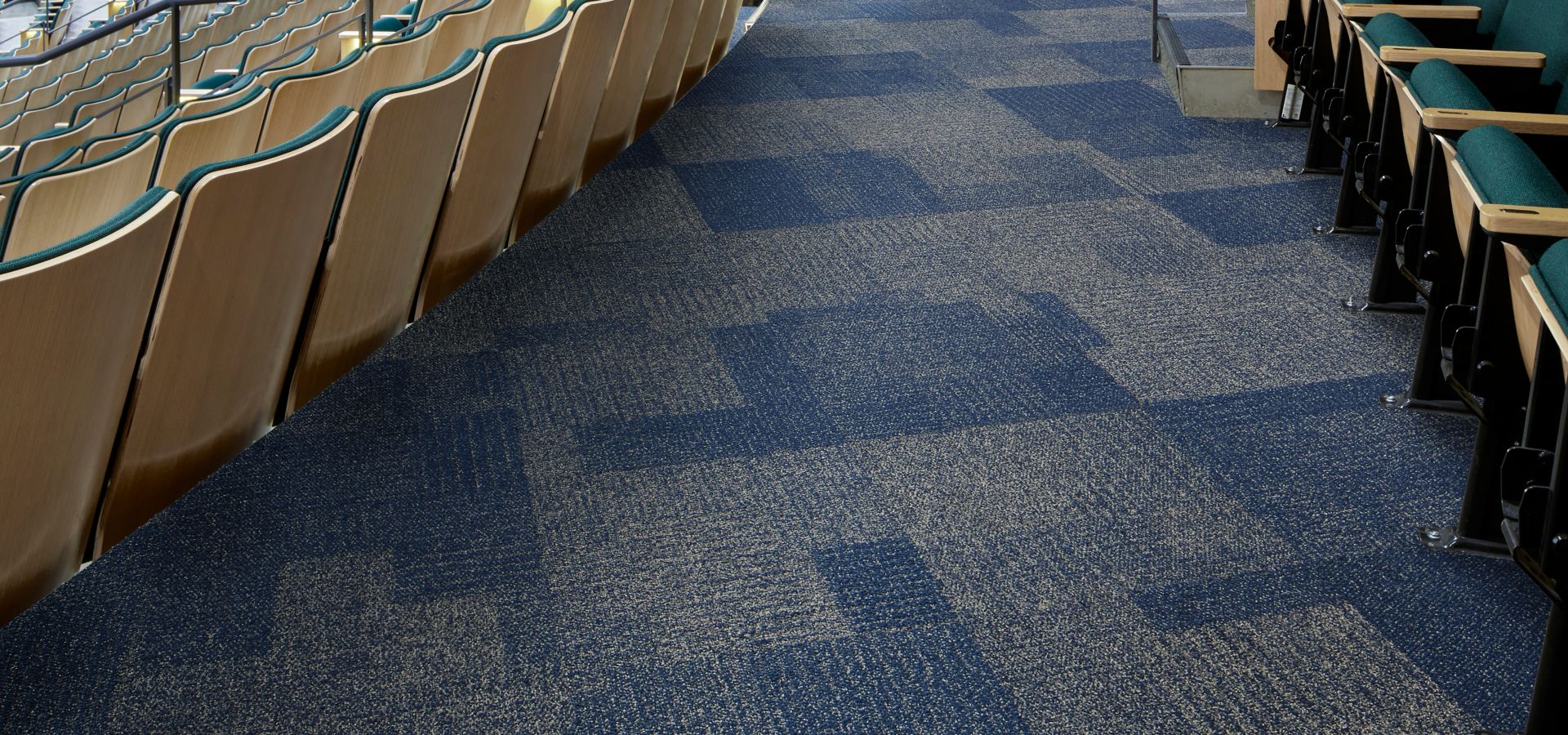 Interface Come and Go carpet tile in theater seating area with wood ceiling