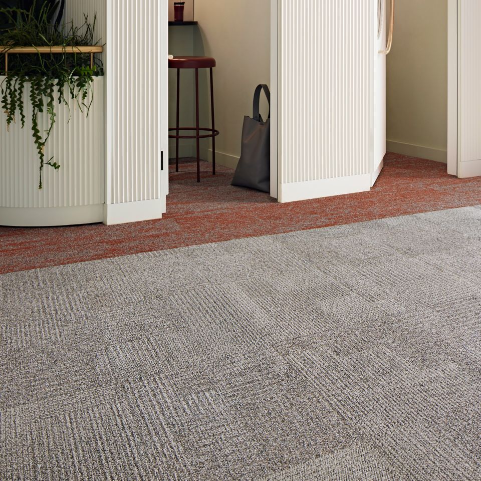 Interface Come and Go carpet tile with Free Reign plank carpet tile in workplace corridor and private booths