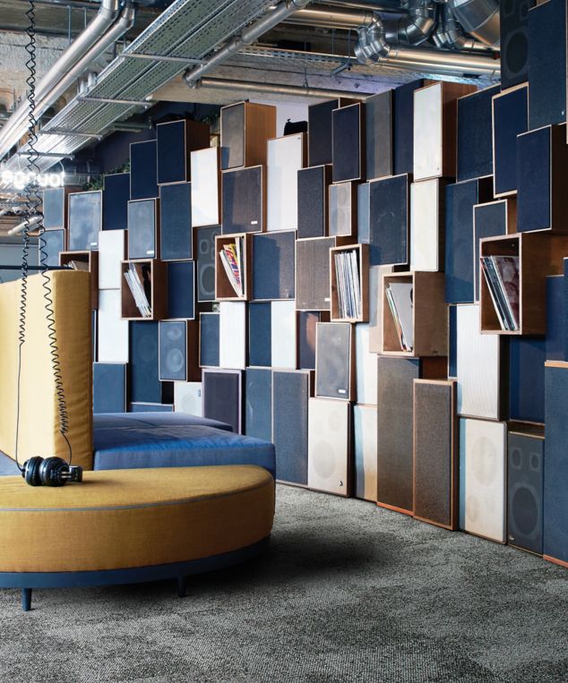 Interface Composure carpet tile with bench seat and speakers on wall