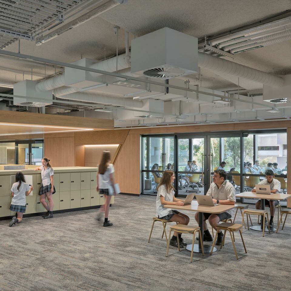 Interface Shallows and Undulating Water carpet tile in high school library