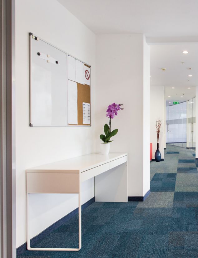 Interface Cubic carpet tile in office hallway