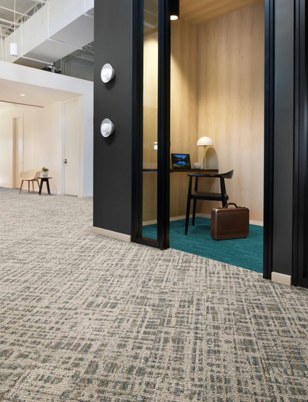 Interface Deckled plank carpet tile in corridor with WG100 carpet tile in  private workspace