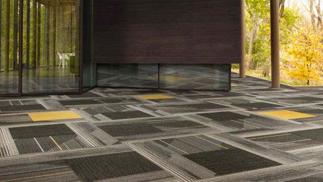 Interface CT102 and Viva Colores carpet tile with CT113 plank carpet tile in recreation area