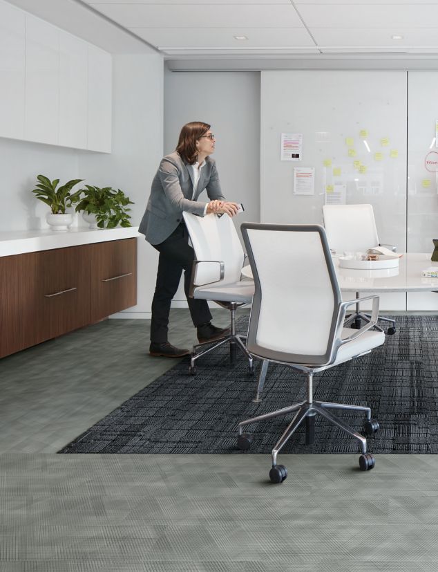 Interface Drawn Lines LVT and Stitch Count plank carpet tile in conference room 