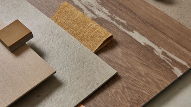 Tabletop palette of Interface Earthen Form LVT with norament castello rubber