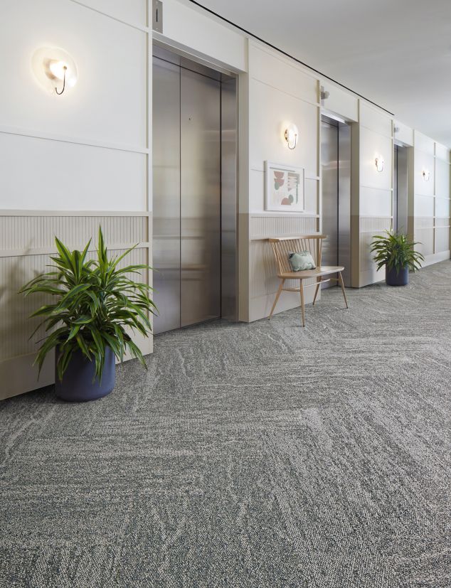 Interface Free Reign plank carpet tile in elevator bank