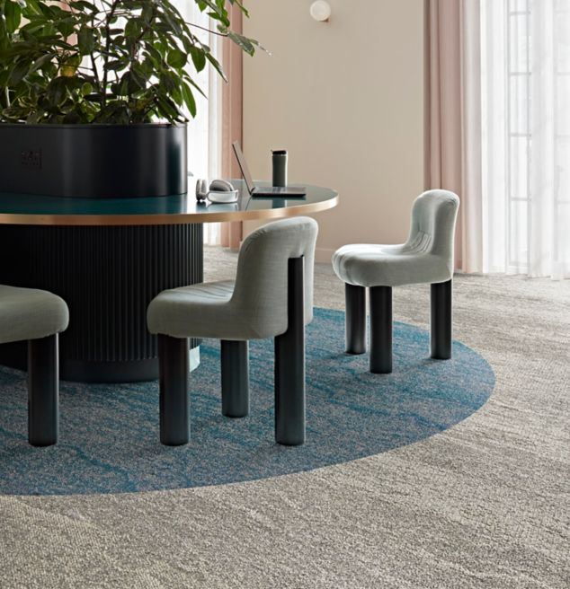 Interface Free Reign plank carpet tile in workplace seating area with large plants