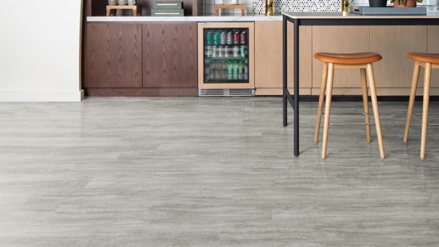 Interface Cliff LVT in Limestone shown in a casual dining area