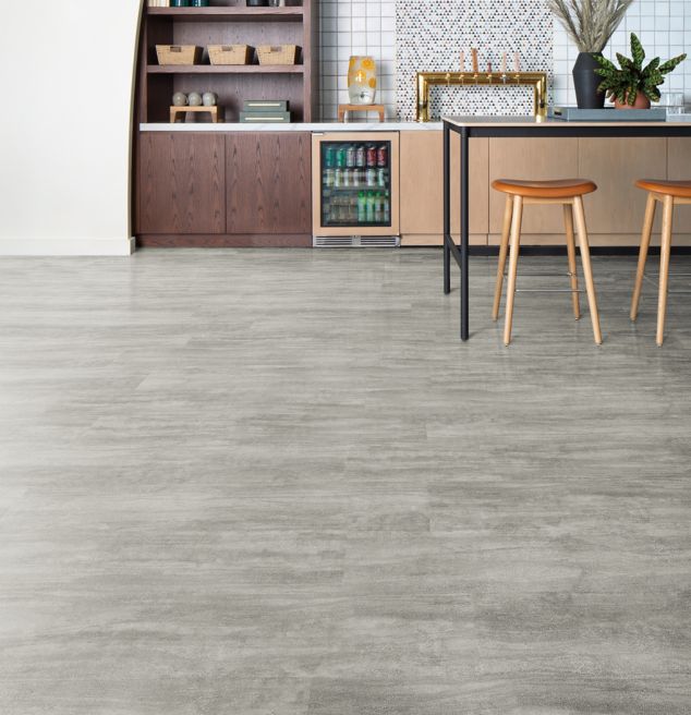 Interface Cliff LVT in Limestone shown in a casual dining area