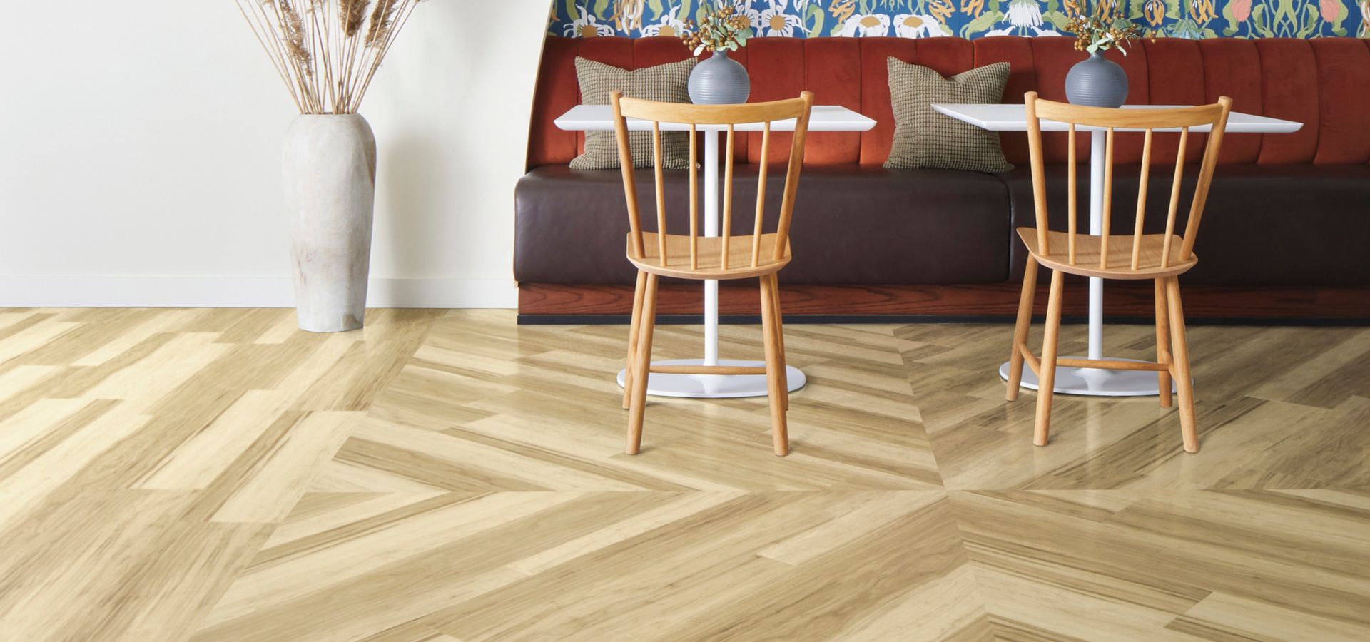 Interface Great Heights LVT in Douglas Fir shown in a casual seating area