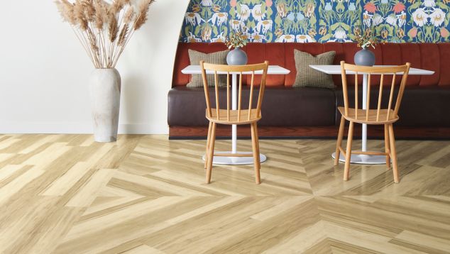 Interface Great Heights LVT in Douglas Fir shown in a casual seating area