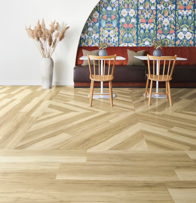 Interface Great Heights LVT in Douglas Fir shown in a casual seating area