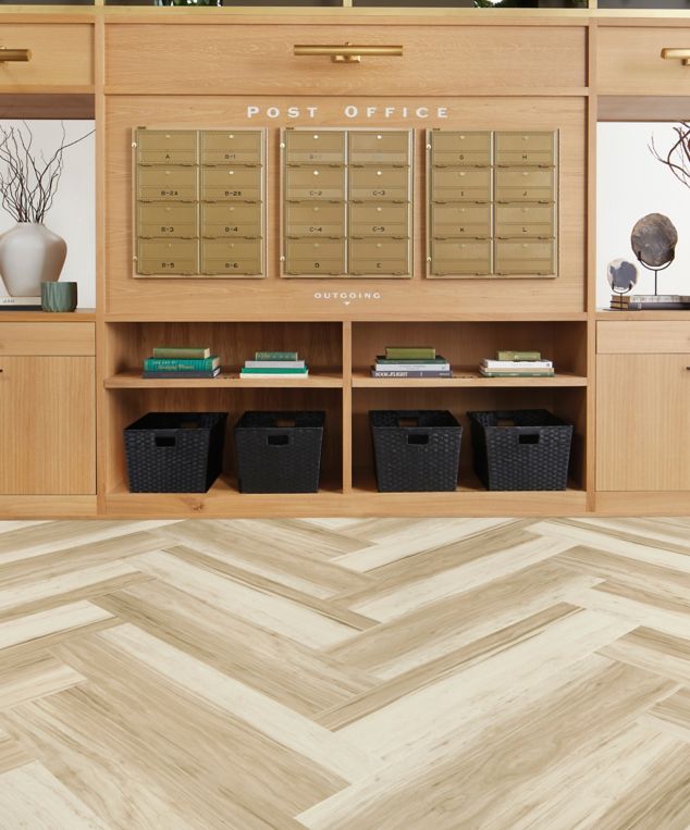 Interface Great Heights LVT in White Oak shown in a casual reception area