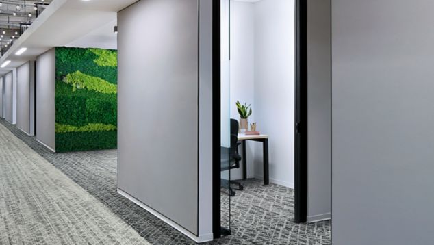 Interface Glisten plank carpet tile in office corridor and small meeting rooms with foliage wall