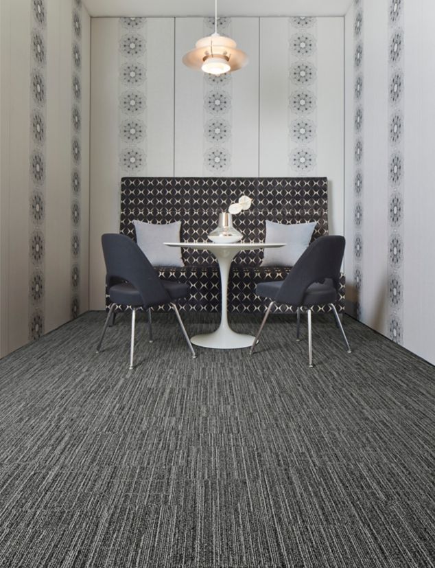 Interface Goes Around plank carpet tile in small meeting space