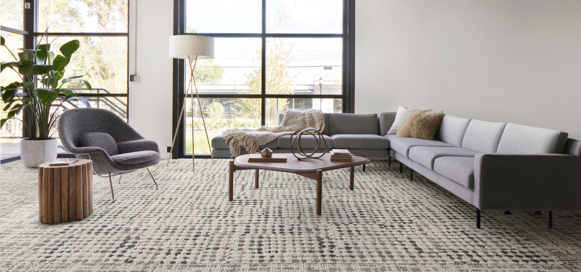 Interface Deckled plank carpet tile with Gossamer carpet tile in workplace lobby seating area
