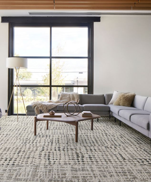 Interface Deckled plank carpet tile with Gossamer carpet tile in workplace lobby seating area