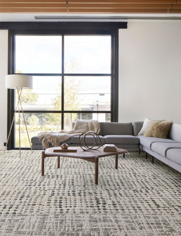 Interface Deckled plank carpet tile with Gossamer carpet tile in workplace lobby seating area