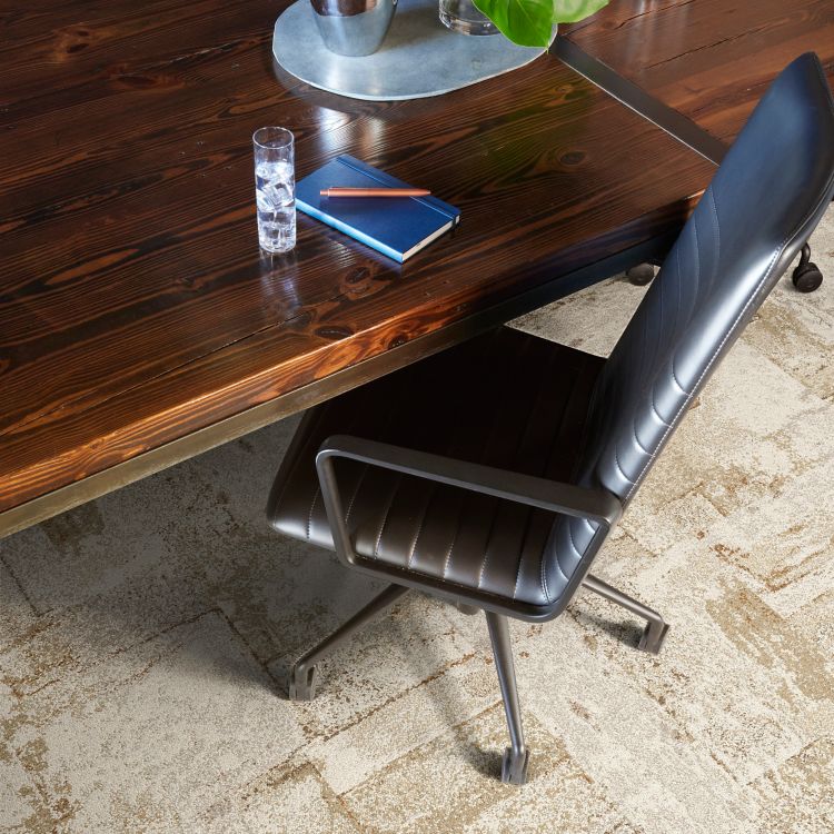 Close-up of Interface Early Light carpet tile in office