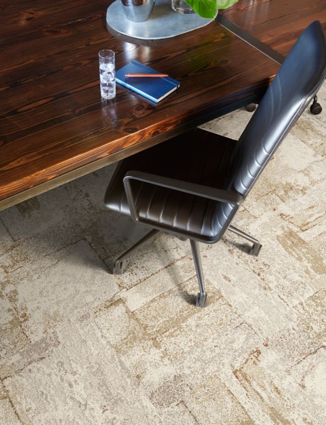 Close-up of Interface Early Light carpet tile in office