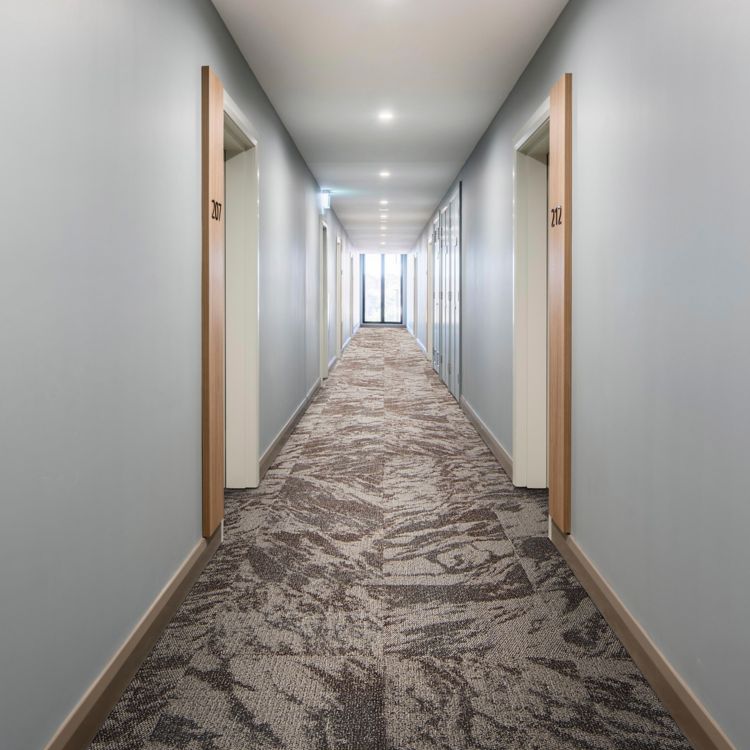 Interface Hard Truth carpet tile in corridor
