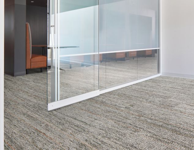 Interface Open Air 402 Stria carpet tile in office corridor under glass door